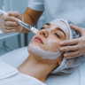 Practitioner applying LHA-based Reboot Peel solution to client's skin at Yeppeun Skin Clinic, a DHA-licensed Korean-standard aesthetic clinic in Jumeirah 2, Dubai